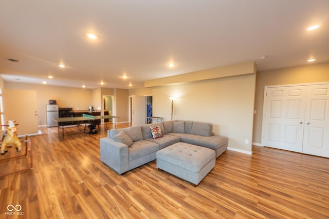 226 S Cave Creek Dr S, Bloomington, IN 47403 - living room with light wood finished floors, recessed lighting, and baseboards