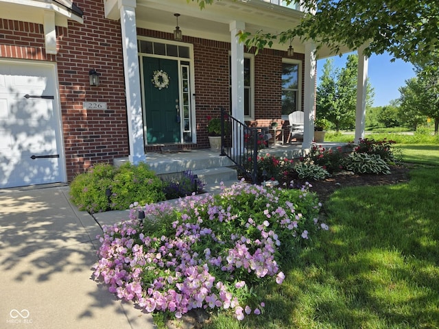 226 S Cave Creek Dr S, Bloomington, IN 47403 - property entrance with a porch and brick siding