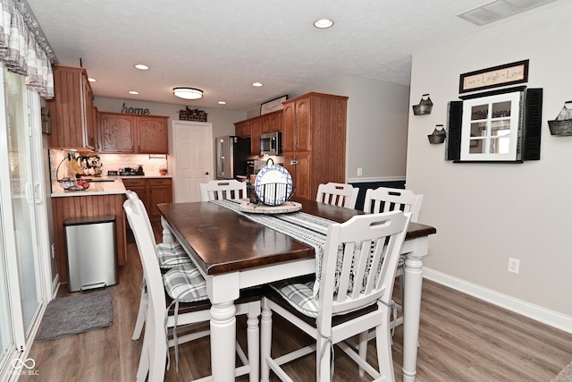 1744 Salina Dr, Avon, IN 46123 - dining space featuring light wood finished floors and recessed lighting