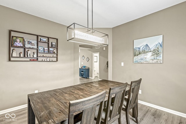 126 Winding Brook Way, Pendleton, IN 46064 - dining area featuring wood finished floors and baseboards