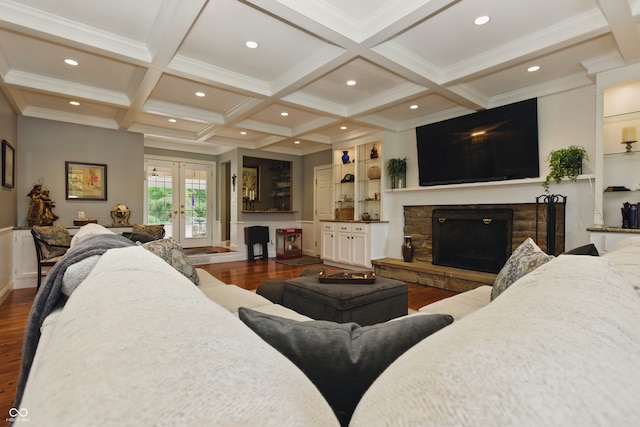 9550 E State Road 46, Bloomington, IN 47401 - living area featuring dark wood-style floors, a stone fireplace, recessed lighting, french doors, and coffered ceiling