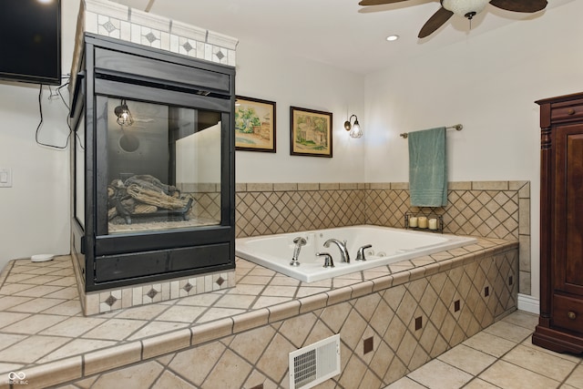 9550 E State Road 46, Bloomington, IN 47401 - bathroom with a garden tub, a ceiling fan, tile patterned floors, and recessed lighting