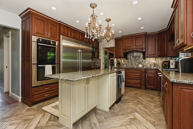 9550 E State Road 46, Bloomington, IN 47401 - kitchen with appliances with stainless steel finishes, a chandelier, dark stone counters, recessed lighting, and beverage cooler