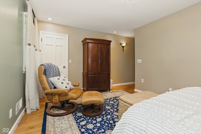 9550 E State Road 46, Bloomington, IN 47401 - bedroom with light wood finished floors, baseboards, and recessed lighting