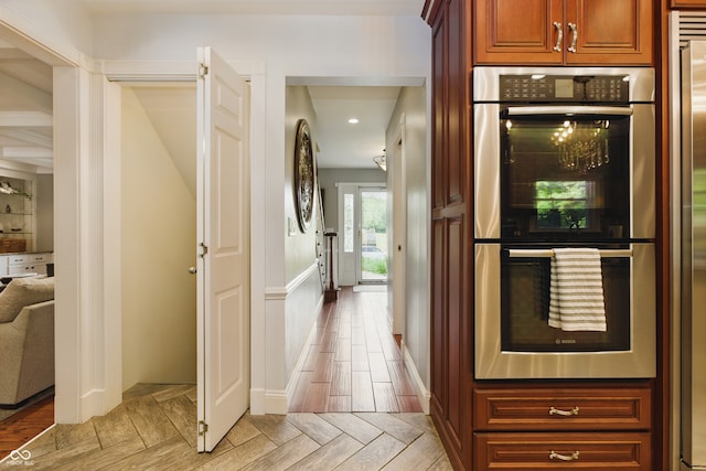 9550 E State Road 46, Bloomington, IN 47401 - kitchen with double oven, recessed lighting, light wood-style floors, and baseboards