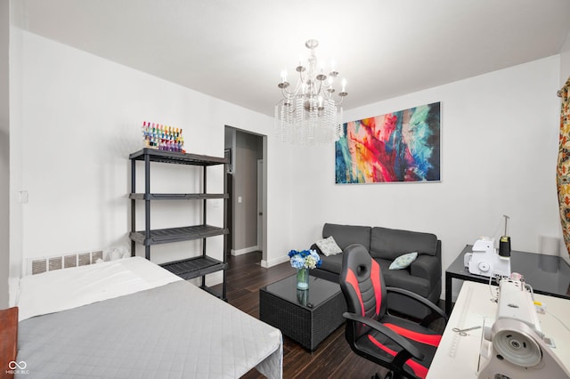 1143 Hampton Dr, Greenwood, IN 46143 - bedroom featuring wood finished floors, a chandelier, and a desk