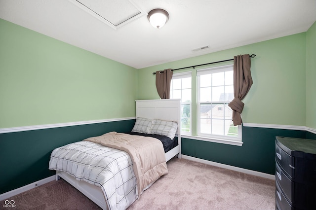 1143 Hampton Dr, Greenwood, IN 46143 - bedroom with light carpet and attic access