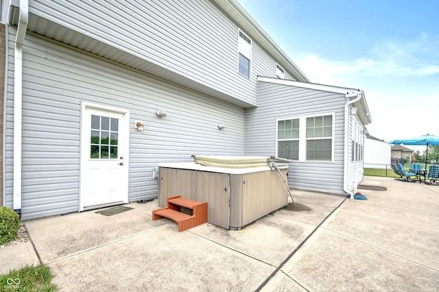 1143 Hampton Dr, Greenwood, IN 46143 - view of patio with a hot tub