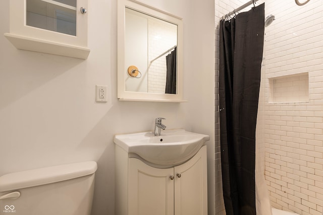 308 S Madison St, Bloomington, IN 47403 - full bathroom featuring toilet and vanity