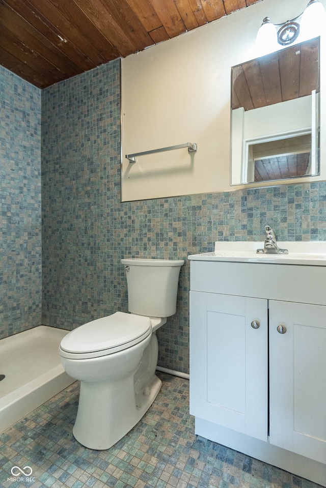 308 S Madison St, Bloomington, IN 47403 - full bathroom featuring wooden ceiling, toilet, vanity, tile walls, and a shower