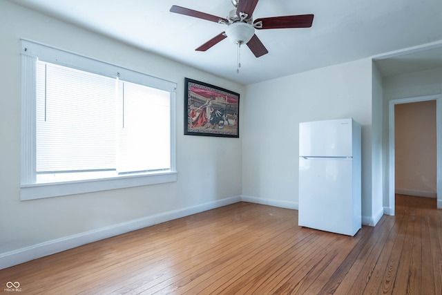308 S Madison St, Bloomington, IN 47403 - unfurnished room with hardwood / wood-style floors, baseboards, and ceiling fan