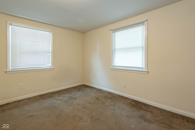308 S Madison St, Bloomington, IN 47403 - unfurnished room featuring carpet flooring and baseboards