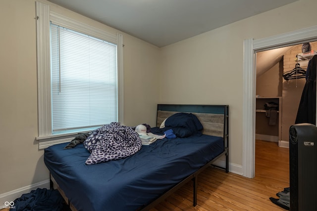 308 S Madison St, Bloomington, IN 47403 - bedroom featuring wood finished floors and baseboards