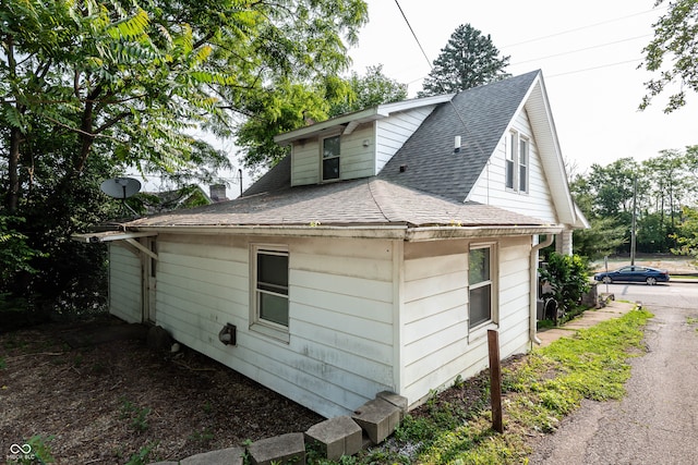 308 S Madison St, Bloomington, IN 47403 - view of side of property featuring a shingled roof