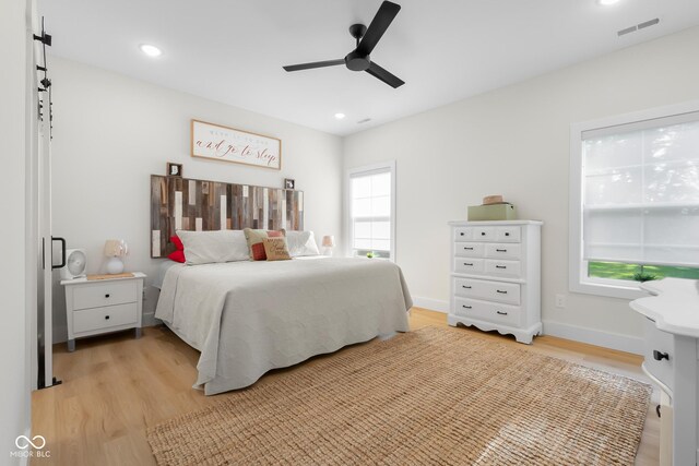 3365 Riverside Dr, Columbus, IN 47203 - bedroom with light wood-style flooring, recessed lighting, and a ceiling fan