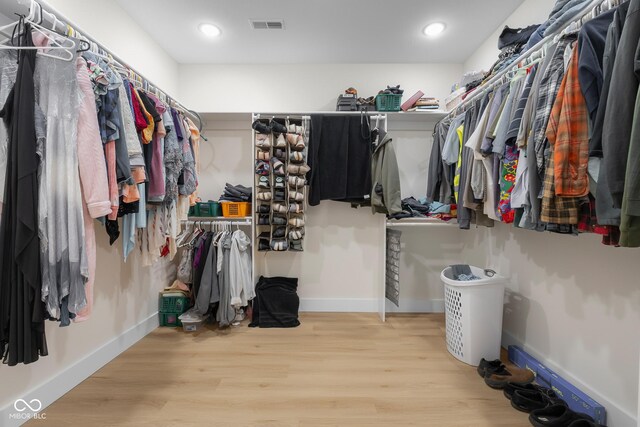 3365 Riverside Dr, Columbus, IN 47203 - spacious closet featuring wood finished floors