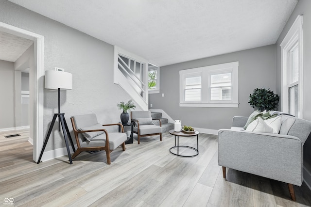 2720 S Taft Ave, Indianapolis, IN 46241 - living room with light wood-style flooring and stairs