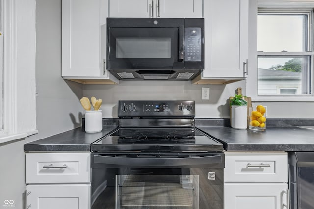 2720 S Taft Ave, Indianapolis, IN 46241 - kitchen featuring black appliances, white cabinetry, and dark countertops