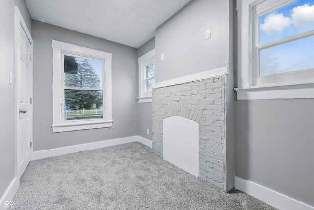 2720 S Taft Ave, Indianapolis, IN 46241 - unfurnished living room with carpet and baseboards
