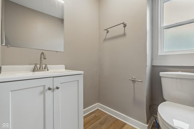 2720 S Taft Ave, Indianapolis, IN 46241 - bathroom with wood finished floors and vanity