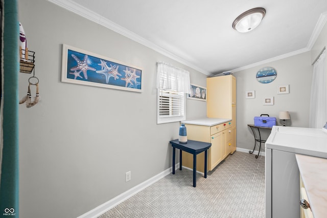 188 Maple Ln, Franklin, IN 46131 - kitchen with crown molding, light countertops, baseboards, and independent washer and dryer