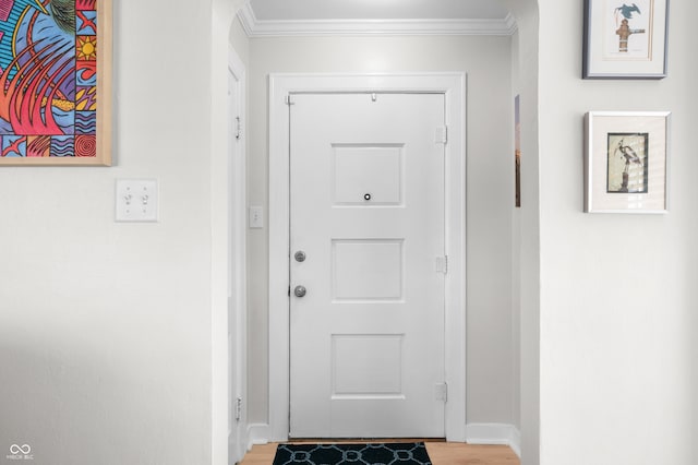 188 Maple Ln, Franklin, IN 46131 - entryway featuring ornamental molding, light wood-style floors, and baseboards