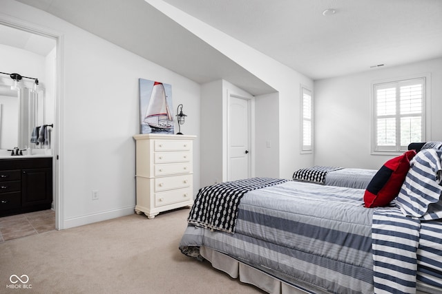 4529 Panthera Leo Dr, Carmel, IN 46074 - bedroom featuring light colored carpet and connected bathroom