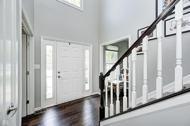 10717 Windermere Blvd, Fishers, IN 46037 - foyer with a high ceiling, dark wood finished floors, and stairway