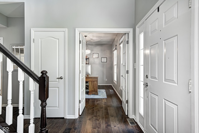 10717 Windermere Blvd, Fishers, IN 46037 - entryway with dark wood-style flooring and stairs