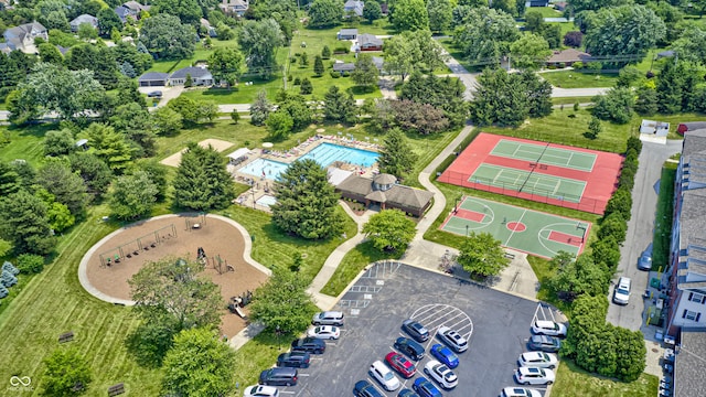 10717 Windermere Blvd, Fishers, IN 46037 - aerial view of a pool and a tree filled landscape