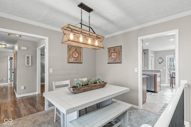 128 Walts Rd, Georgetown, IN 47122 - dining area with baseboards, a textured ceiling, and crown molding