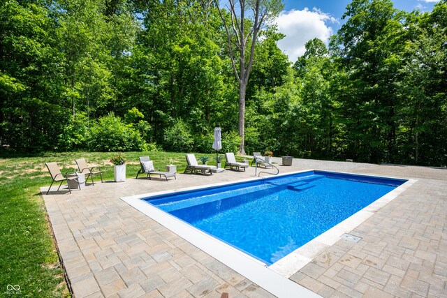 128 Walts Rd, Georgetown, IN 47122 - outdoor pool with a patio area and a lawn