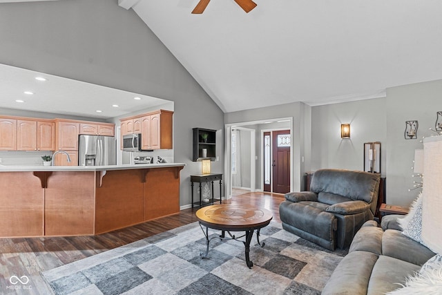 128 Walts Rd, Georgetown, IN 47122 - living area with wood finished floors, recessed lighting, ceiling fan, high vaulted ceiling, and baseboards
