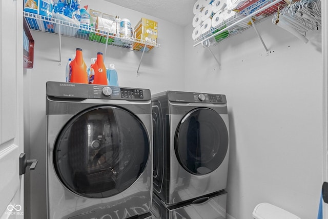 128 Walts Rd, Georgetown, IN 47122 - washroom featuring washing machine and clothes dryer and a textured ceiling
