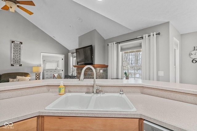 128 Walts Rd, Georgetown, IN 47122 - kitchen featuring a sink, open floor plan, lofted ceiling, a ceiling fan, and light countertops