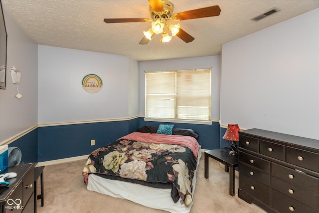 1159 Oak Leaf Rd, Franklin, IN 46131 - carpeted bedroom with a textured ceiling and a ceiling fan