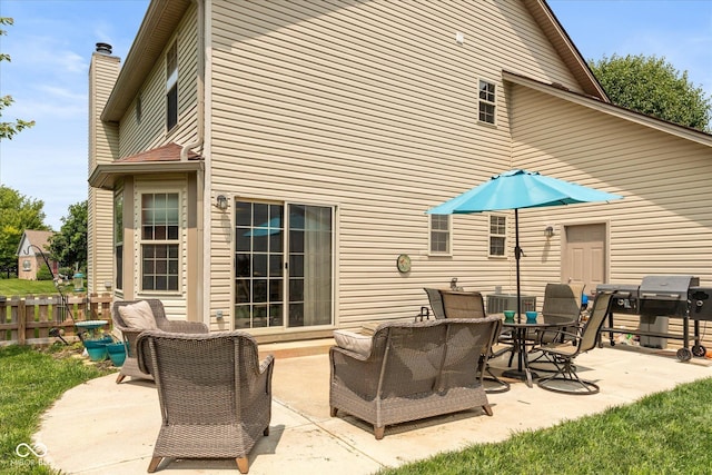 1159 Oak Leaf Rd, Franklin, IN 46131 - view of patio / terrace featuring a grill and an outdoor living space