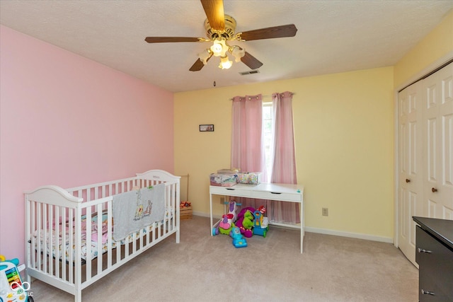1159 Oak Leaf Rd, Franklin, IN 46131 - carpeted bedroom with a closet, ceiling fan, and a nursery area