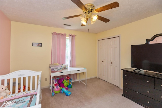 1159 Oak Leaf Rd, Franklin, IN 46131 - bedroom with carpet flooring, a closet, ceiling fan, and a textured ceiling