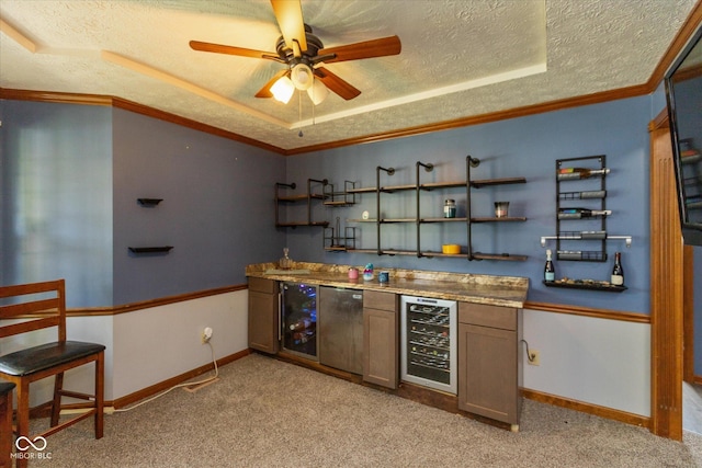 1159 Oak Leaf Rd, Franklin, IN 46131 - indoor bar featuring wine cooler, a textured ceiling, ceiling fan, light carpet, and a raised ceiling