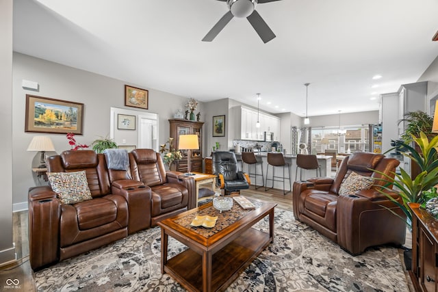 655 N Sobota Way, Trafalgar, IN 46181 - living area featuring a ceiling fan, light wood-style flooring, and recessed lighting