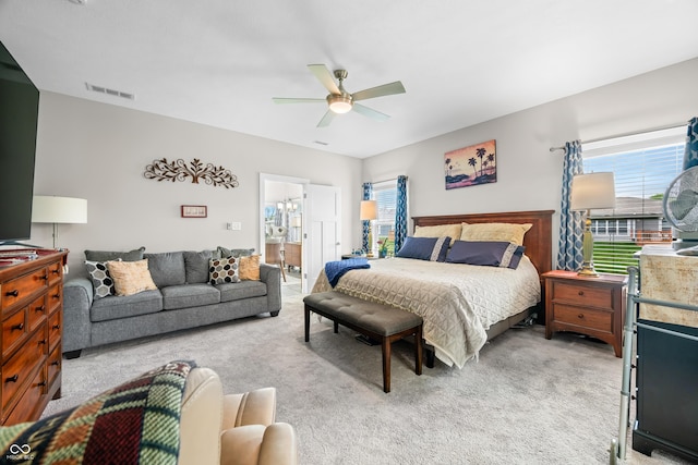 655 N Sobota Way, Trafalgar, IN 46181 - bedroom with light colored carpet and a ceiling fan
