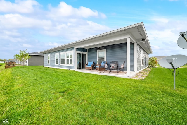 655 N Sobota Way, Trafalgar, IN 46181 - back of property with a patio area and a lawn