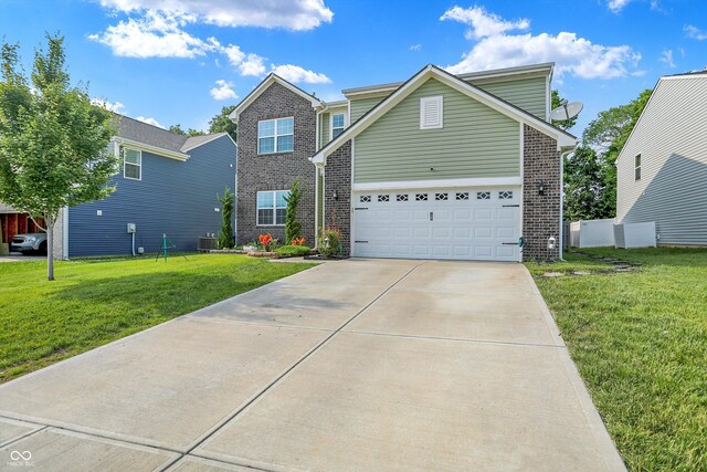 10902 Jimmy Lake Dr, Indianapolis, IN 46239 - traditional-style home featuring brick siding, driveway, and a front lawn
