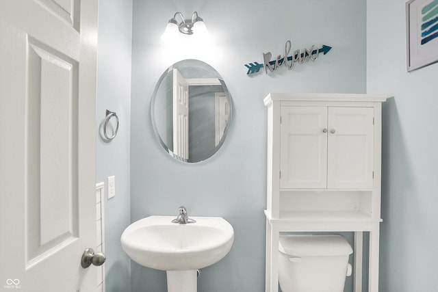 10902 Jimmy Lake Dr, Indianapolis, IN 46239 - bathroom with toilet and a sink