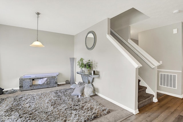 10902 Jimmy Lake Dr, Indianapolis, IN 46239 - stairway with wood finished floors and baseboards
