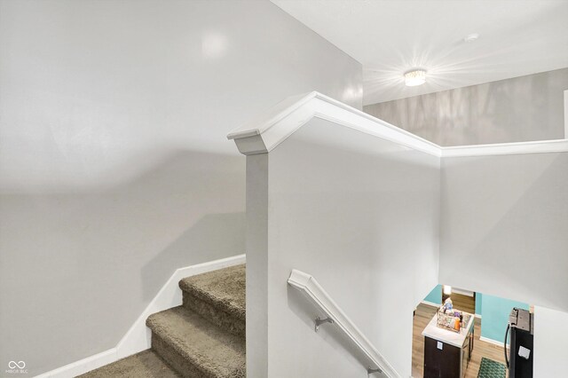 10902 Jimmy Lake Dr, Indianapolis, IN 46239 - stairs featuring baseboards