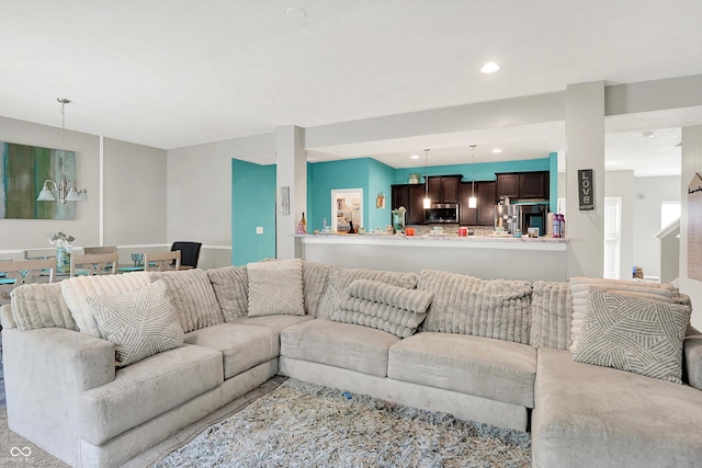 10902 Jimmy Lake Dr, Indianapolis, IN 46239 - living area with a chandelier and recessed lighting