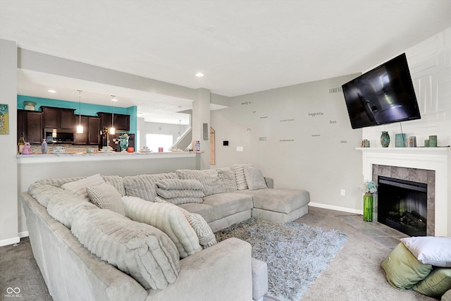 10902 Jimmy Lake Dr, Indianapolis, IN 46239 - carpeted living room featuring a tiled fireplace and recessed lighting