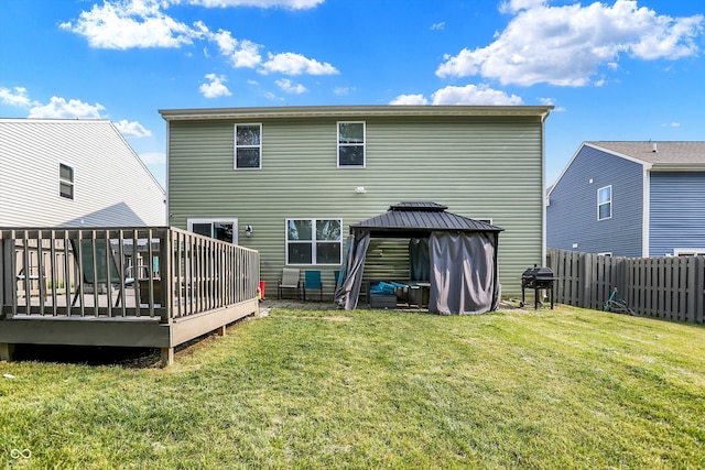 10902 Jimmy Lake Dr, Indianapolis, IN 46239 - back of house with a gazebo, a fenced backyard, and a wooden deck